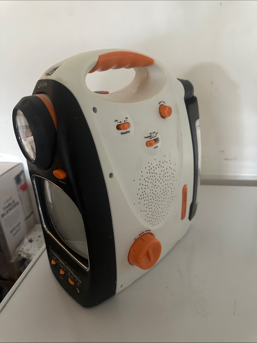 Portable Emergency TV, Radio with Flashlight - White & Orange